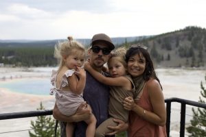 Massage Therapist by popular Colorado Springs Massage Therapist, Camino Massage: image of a family standing together in Yellowstone National Park. 